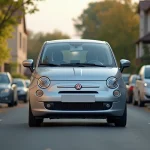 Voiture compacte de 90 chevaux garée dans une rue résidentielle, vue en angle 3/4 avant, illustrant la puissance quotidienne d'un moteur accessible